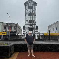 Feets standing in front of the clock tower in Stratford, taken on the way to New Plymouth. The lens was covered in rain drops.
